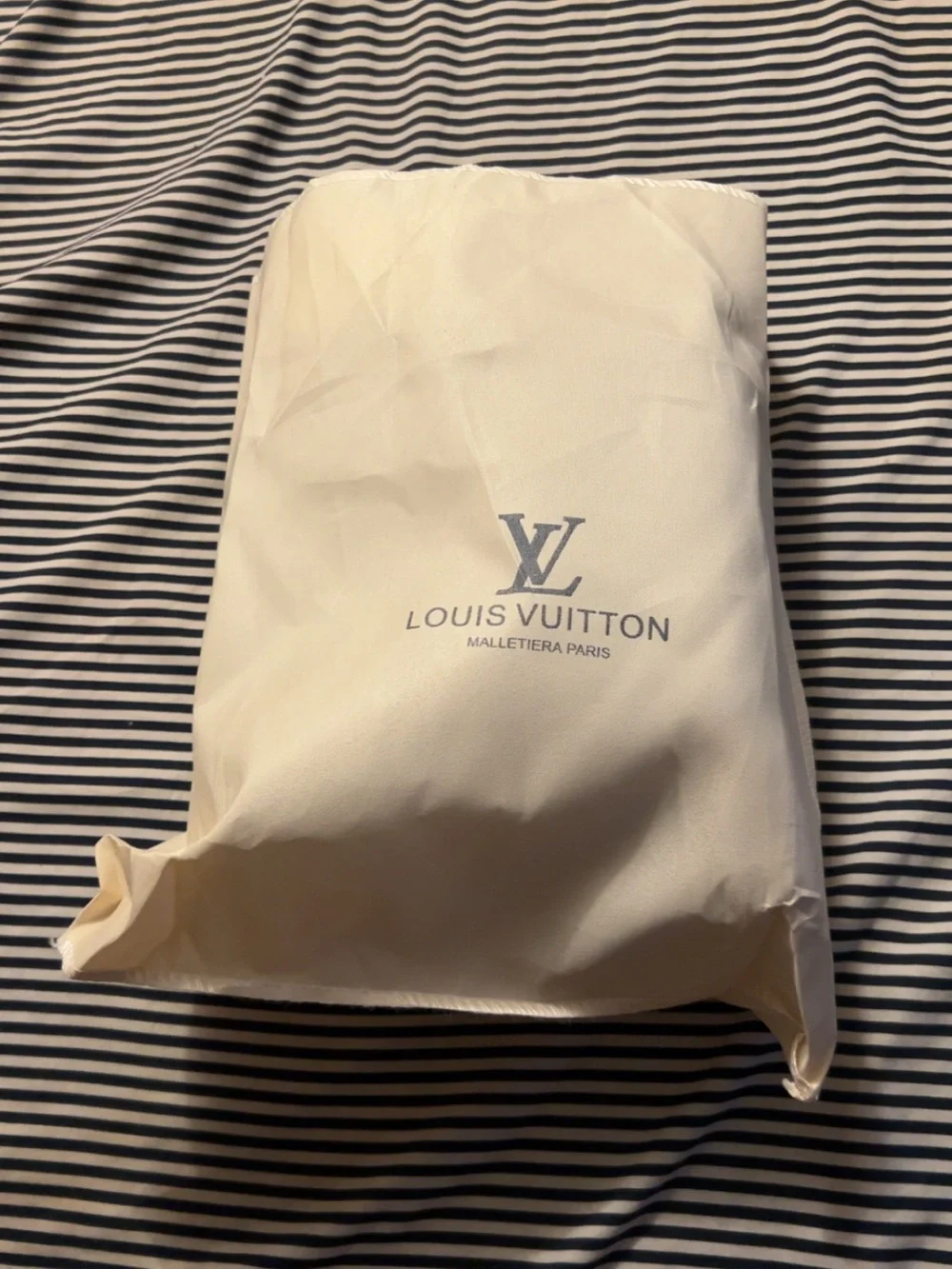 Louis Vuitton Monogram Drawstring Bucket Bag in Brown and Tan